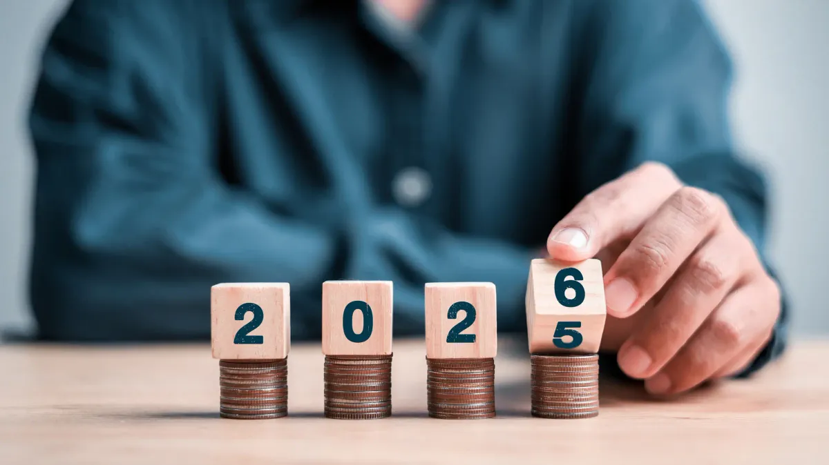 Man turns dice to 2026. Source: Getty Images