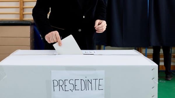 Populist surge in Romanian presidential election sees PM humbled